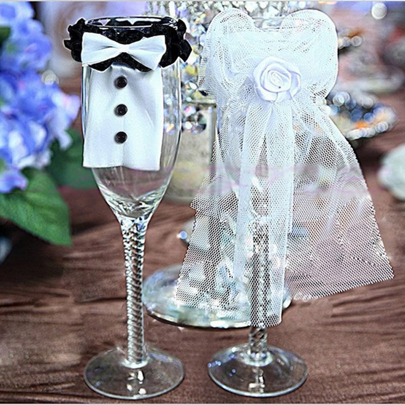 

Beautiful Wedding Party Decorations 2 Pieces One Set Bride & Groom White Tux Bridal Veil For Champagne Flutes Wine Glasses Table Decor DIY, Picture color