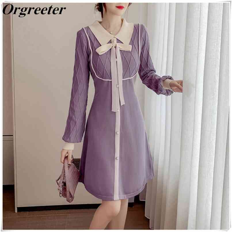 

Elegant Lady Knit Bottoming Sweater Dress Women Color stitching Bow tie Lantern Sleeve Pearl Button Short Dresses 210602, Purple