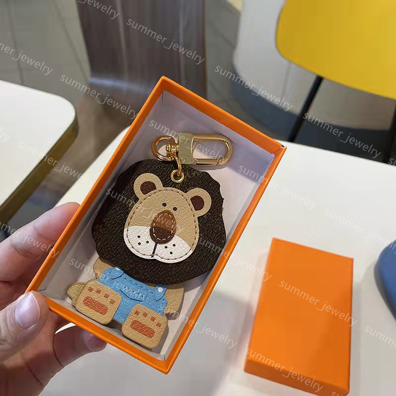 

Designer Cute Lions Keychain Key Chain & Ring Holder Brand Designers Keychains For Porte Clef Gift Men Women Car Bag Pendant Accessories High Qualtiy With Box L038