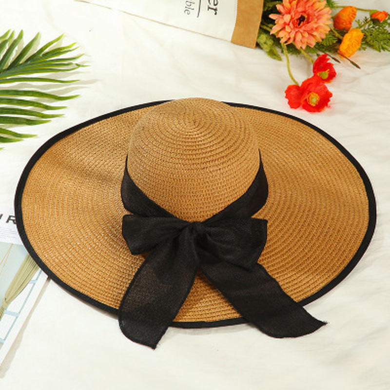 

2021 New Solid Ribbon Belt Band Big Brim Women Outdoor Summer Beach Sun Protective Travel Bowknot Elegant Straw Hats Nqc1