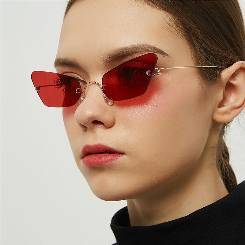 

Free shipping Pointed cat eye sunglasses for women retro trend with bezel-less small frame glasses for men 2021