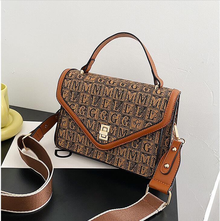 

Factory Outlet women shoulder bag elegant atmosphere edge contrast leather handbag multifunctional polka dot fashion handbags street trend printed backpack