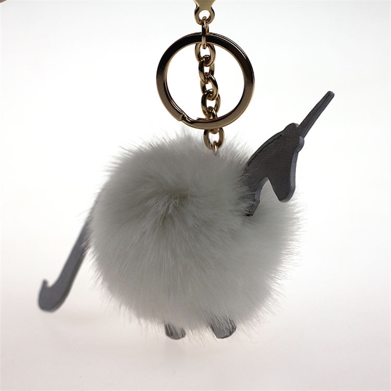 

Creative Unicorn metal button doll Plush key chain wool ball pendant