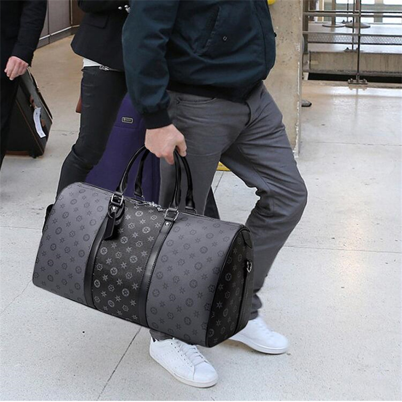 

yijianzhongai Designers fashion duffel bags luxury men female travel bags leather handbags large capacity holdall carry on luggage overnight weekender bag 41412#