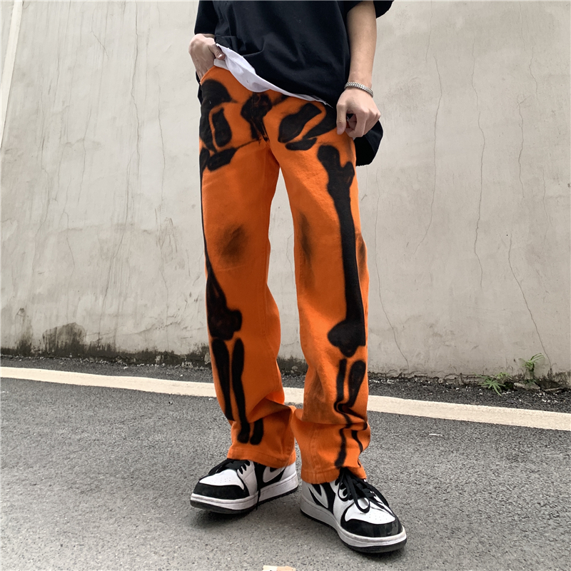 

2021 New Original Skull Graffiti Printing Ripped Jeans for Men in a Straight Line... Casual Denim Pants of Large, High Street Loose Afforces, Orange.