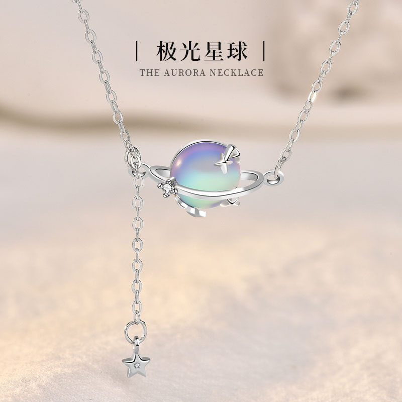 

s925 Sterling Silver Moonstone Planet Necklace Female Sen is a niche design with a tassel long collarbone chain
