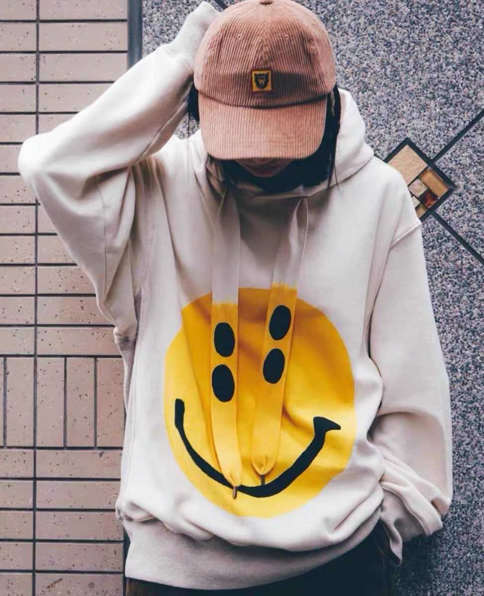 

Vintage New Kapital smiley face printing hanging dyeing drawstring hooded casual couple long sleeve loose sweater, Off the shelf beige
