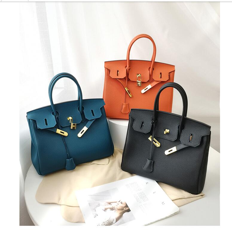 

D54 New style men's and women's shoulder bag high quality handbag fashion bag designer handbag purse