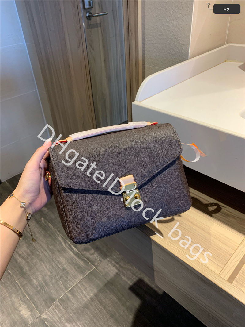 

High Quaity luxury designer Lady Fashion Handbags Genuine Leather Geometric Adjustable Shoulder Single Shoulders bags Classic Timeless Postman Bag, Color w