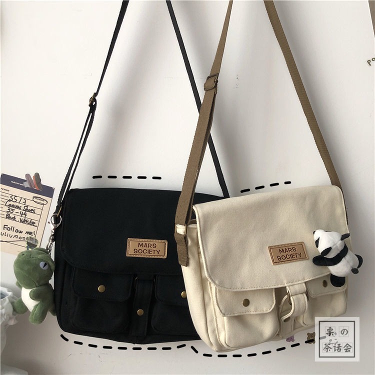 Bolsa de lienzo para mujer Departamento japonés Harajuku Windsuit Messenger Bag Femenino Estudiantes coreanos Bolsas de hombro
