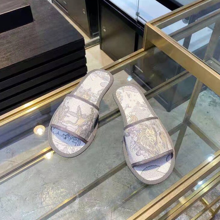 Tory Sandales Femmes Pantoufles confortables Chaussures plates de loisirs 2021 Première printemps Motif de broderie électrique à domicile de la c