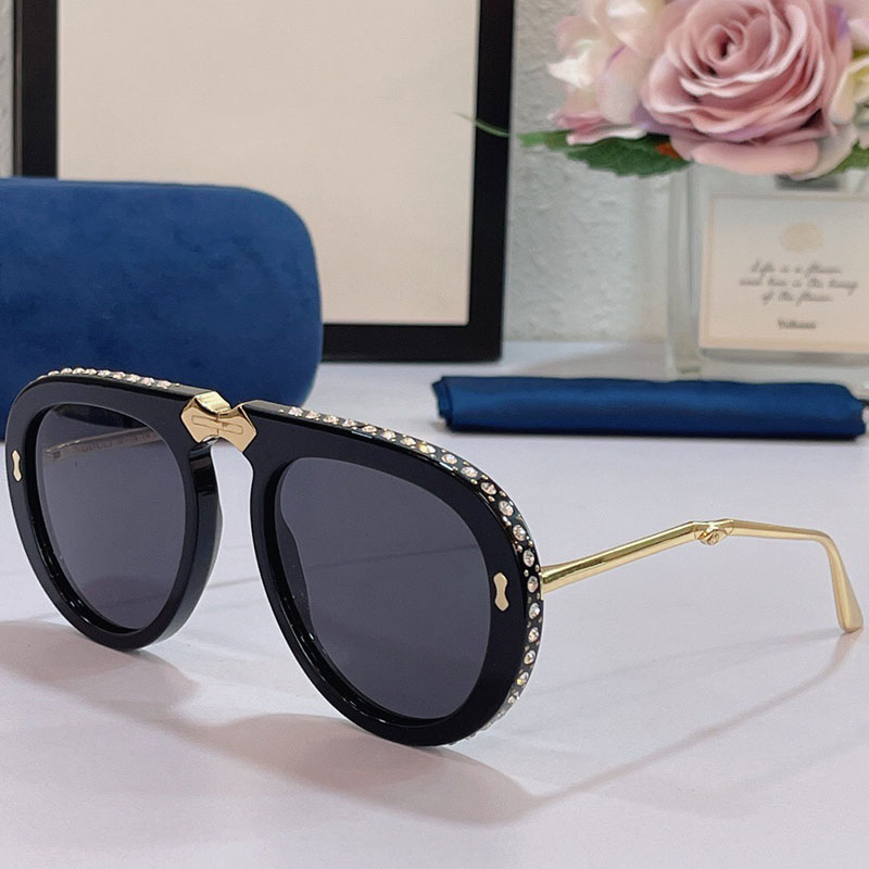 

Womens or mens sunglasses G 0307S classic black thick plate frame with diamond decoration foldable metal temple oval lens designer top quality original design