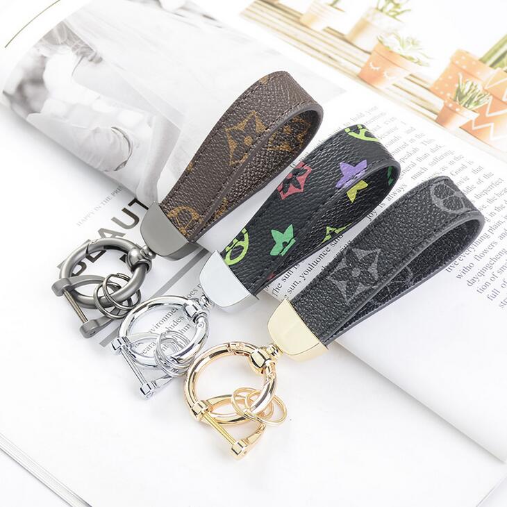 

Luxurys Key chain Buckle lovers Car Keychain Handmade Leather Designers Keychains Men Women Bag Pendant Accessories 14 Color, Silver