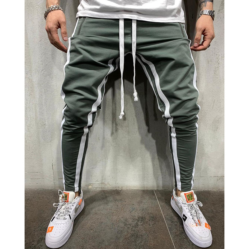 

2021 Casual Elastic Band Pants Joggers Striped Sweatpants Thin Fitness Zipper Men's Pockets Long Athletic Solid Cotton J9bh, Black and white.