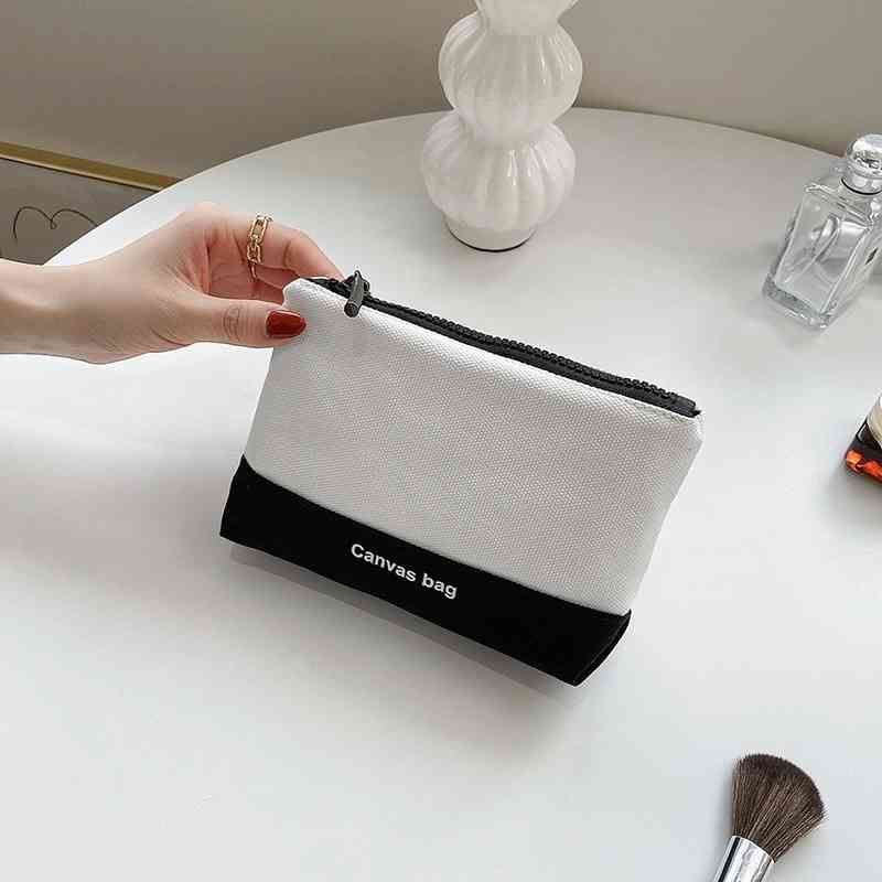 

Canvas portable women's travel wash make-up storage bag, White with black