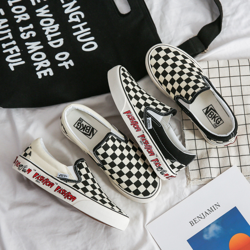 

Black and white chessboard Plaid canvas shoes for men and women1