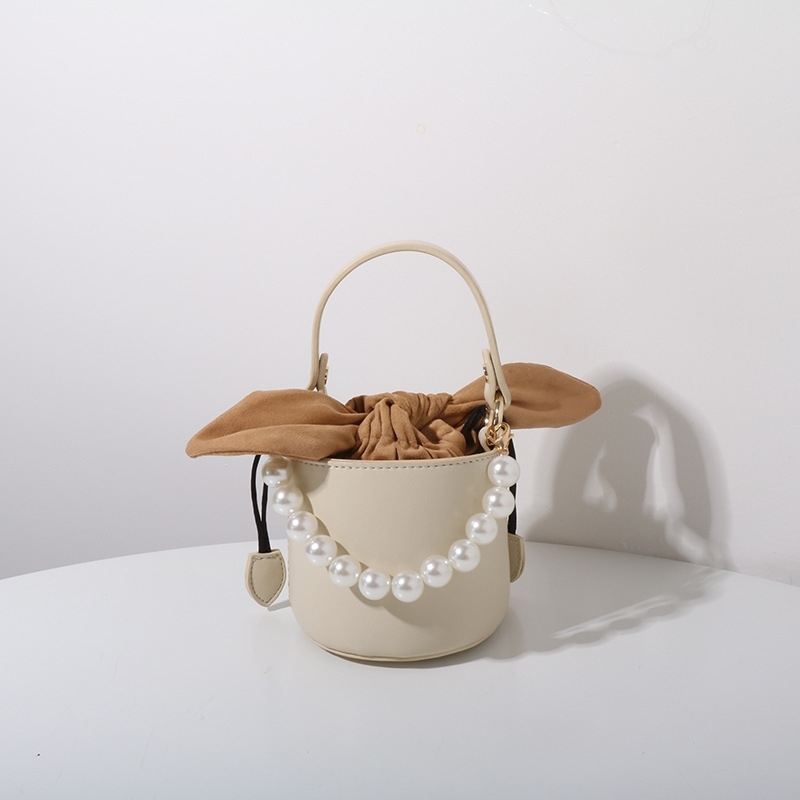 

Niche design small mini mouth red bag summer concave shape rabbit ear Pearl Chain Mini Bag, Yellow
