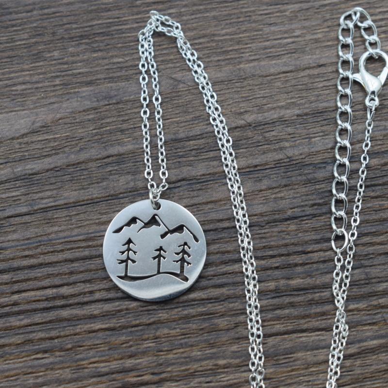 

Pendant Necklaces 12pcs Stainless Steel Hollow Pine Tree Umder The Mountain Necklace Outdoor Camping Jewelry