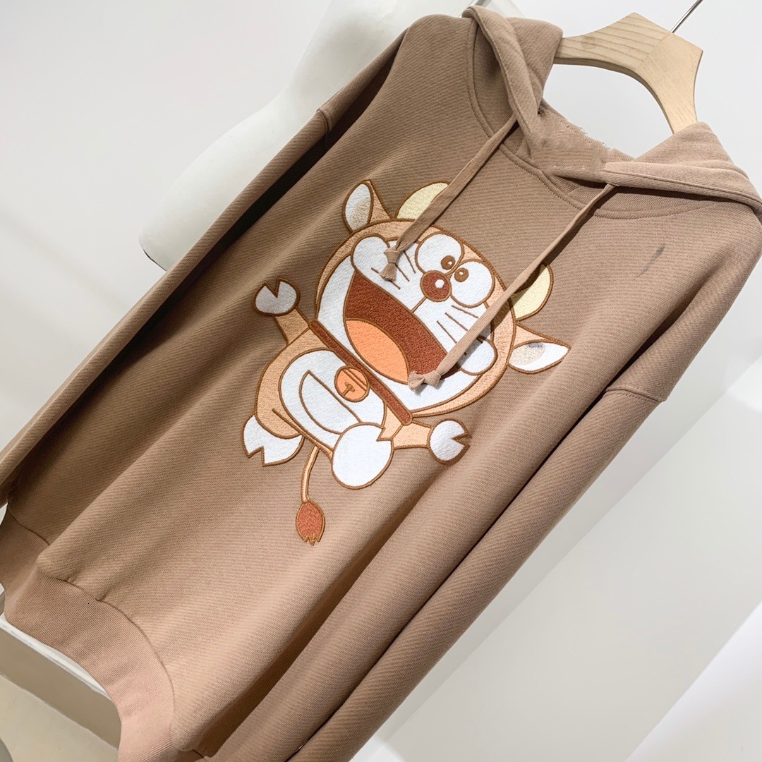 

Spring and autumn 2021 ox horn Doraemon cartoon print age reducing loose and thin versatile hooded drawstring sweater, Black