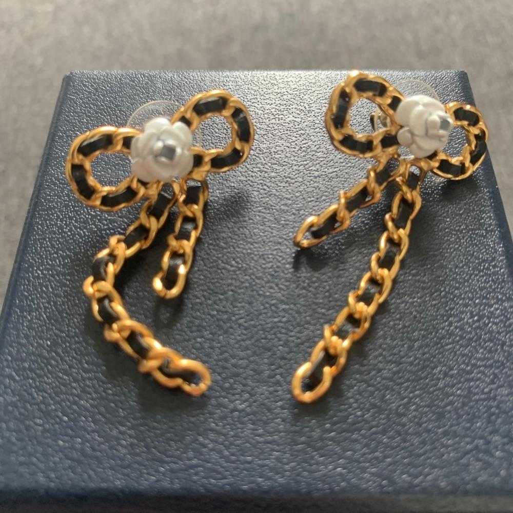 

Brand Fashion Bowknot Jewelry Gold Color Rose Flower Earrings Camellia Earrings Tassel Leather Design Wedding Party Earrings