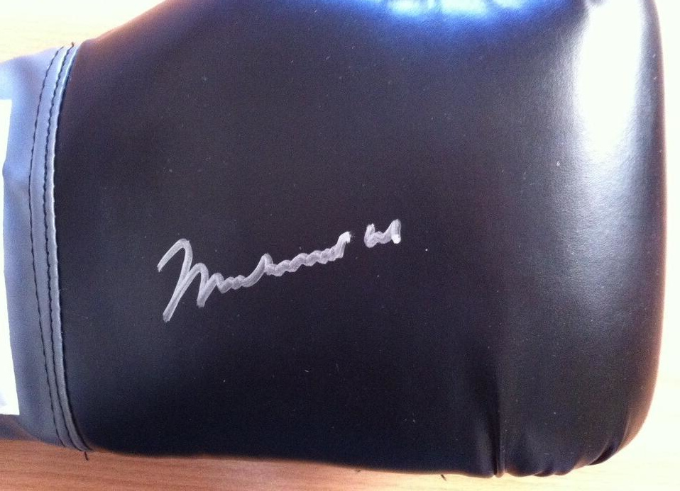 

Muhammad Ali signed AUTOGRAPHED black BOXING GLOVES