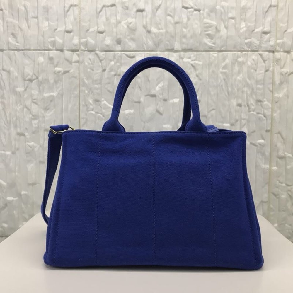 Luxury 2020 Toile Escale Billetera de Disñador Boîte à fourre-tout Prafe Deep Blue Plage Boite Lettre Lettre Fil Mode Sac à main Top Hotte Sac