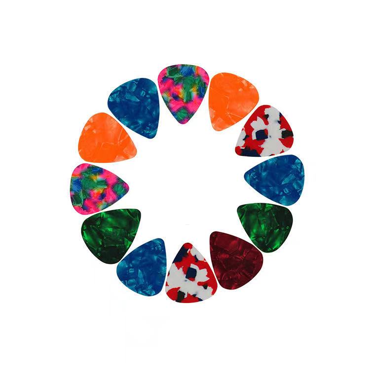 

Lot of 100PCS Wholesale Guitar Picks Celluloid 0.71mm/0.46mm Plectrums Color mixing
