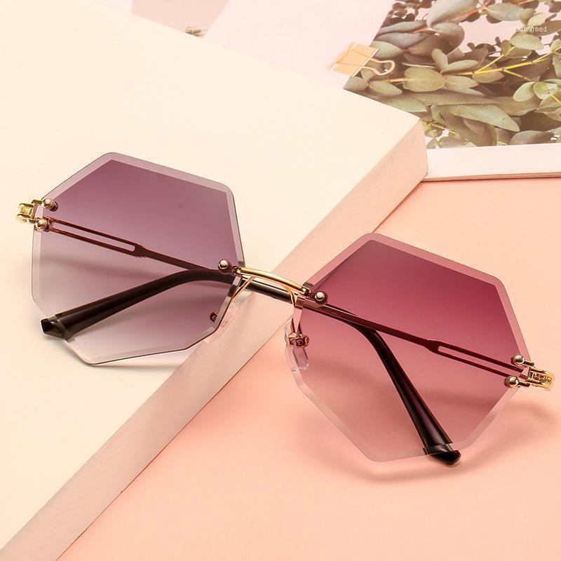 

Sunglasses 2021 Fashion Brand Design Rimless Women Vintage Sexy Lady Cutting Lens Gradient Round Sun Glasses For Female UV4001