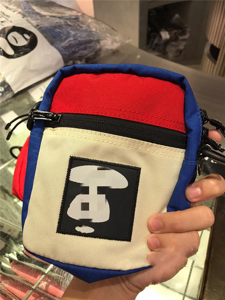 

Drainage style 2021 summer tide brand AAPE square men's and women's canvas slant span small bag NG1R