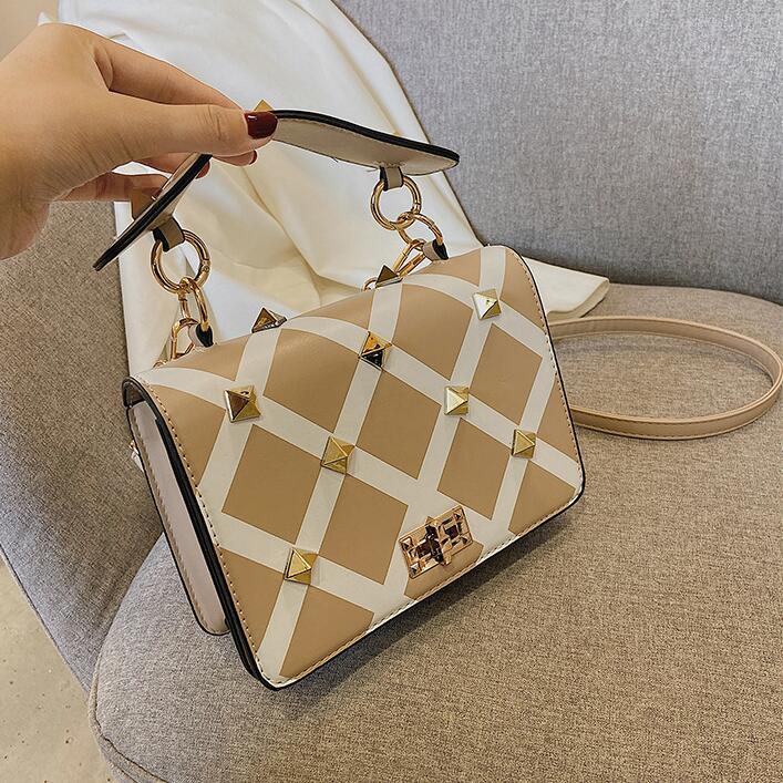 Factory wholesale women chain bags street personalized rivet punk handbags European and American popular plaid handbag shaped high quality leathe