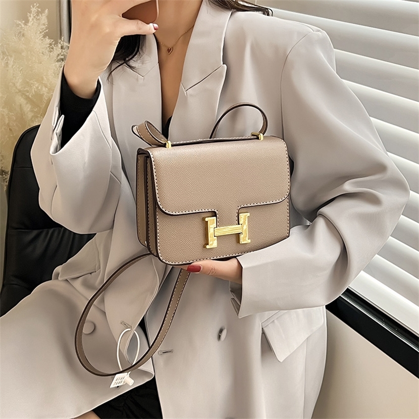 

Wholesale Online 2022 new buckle Kangkang stewardess tofu net red lock Single Shoulder Messenger small square bag, Green