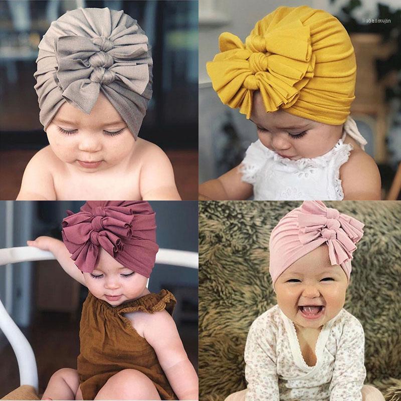 

Cute Born Baby Hats Bowknot Soft Design Girls Caps Infant Hat Turban Elastic Cap1, Yellow