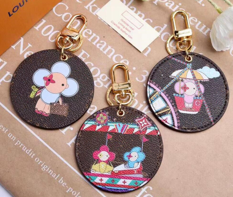 

Fashion Playground Brand Key Wallet Letter Printing Mens Car Keychain Classic Sunflower Couple Keychains Luxury Designer Female Bag Pendant Accessory