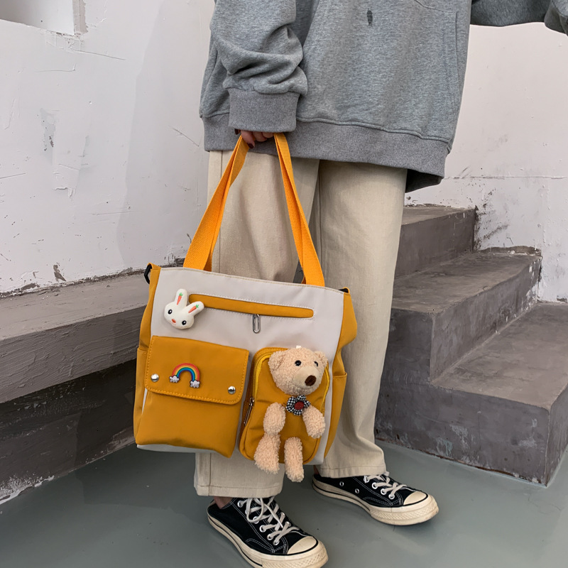 

75% OFF Women's 2021 new Korean canvas pendant Single Shoulder Messenger bag