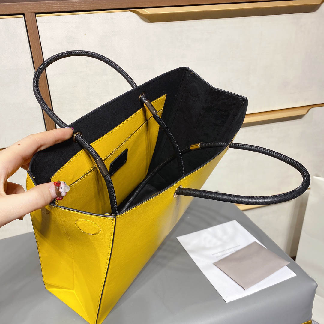 

Bright Yellow Rectangular Handbag Simple trendy shoulder bag for both men and women Luxury design alphabetic leather pocket