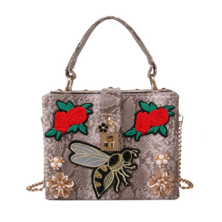 

Factory wholesale women leather shoulder bag elegant atmosphere embroidered handbag street personality Serpentine chain bags sweet Beads Diamonds handbags