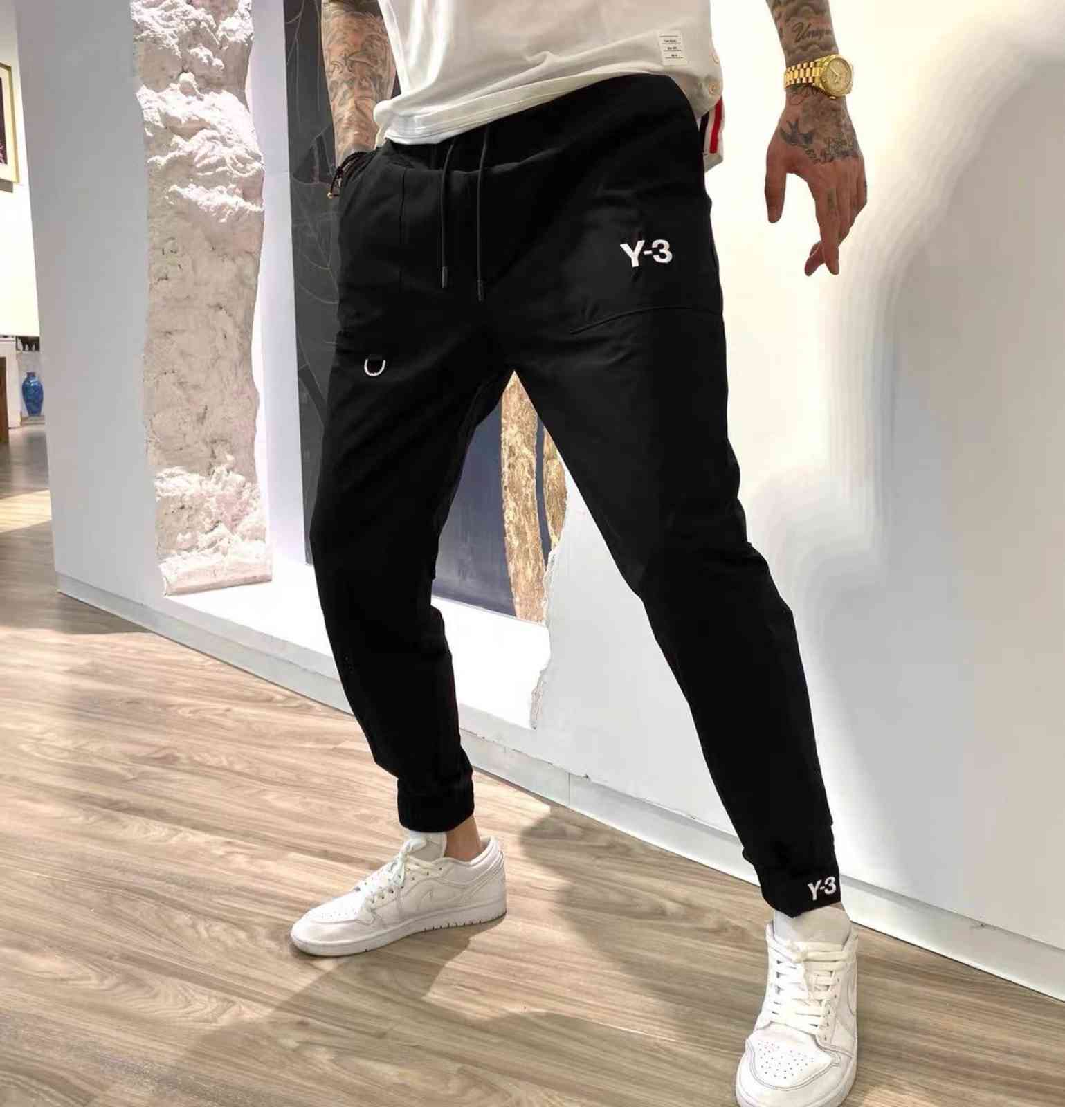 

20ss pants men running sweatpants loose Imported woven waterproof fabric Feel smooth soft and delicate Ribbed cuffs asian size black pants