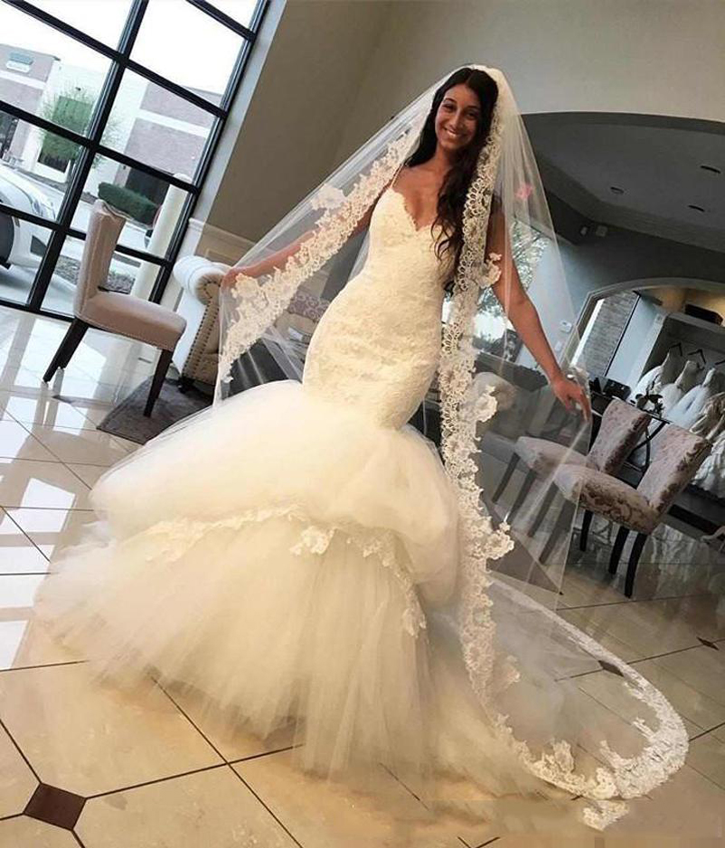 

Custom Made Spaghetti Lace Mermaid Wedding Dresses with Applqiues Court Train Backless Tulle Wedding Bridal Gowns, White