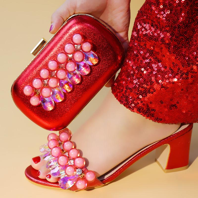 red heels and matching bolsa