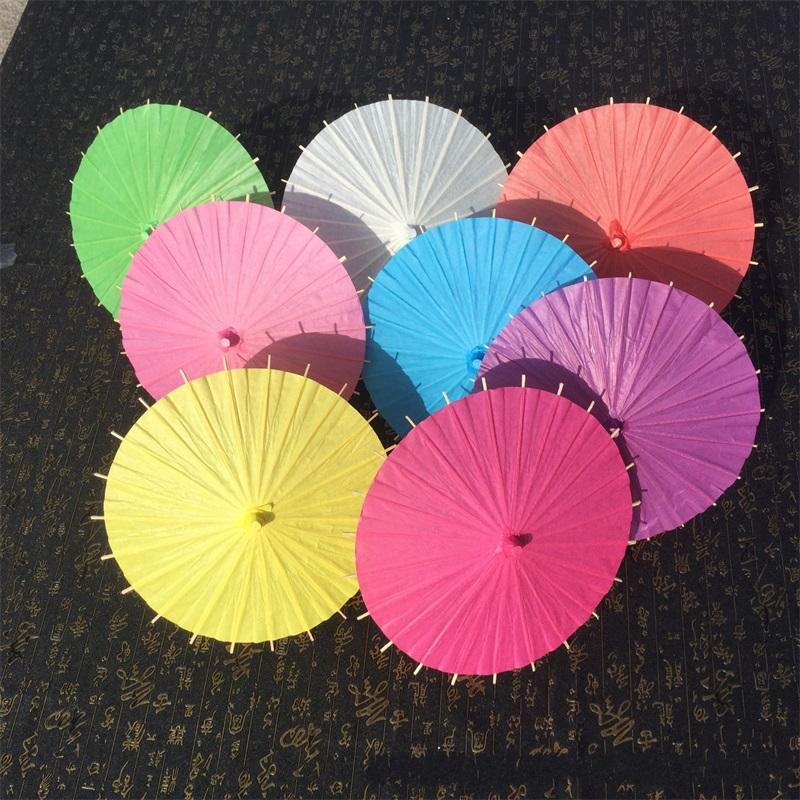 

DHL 20/30/40/60cm Chinese Japanesepaper Parasol Paper Umbrella For Wedding Bridesmaids Party Favors Summer Sun Shade Kid Size, Remark colors