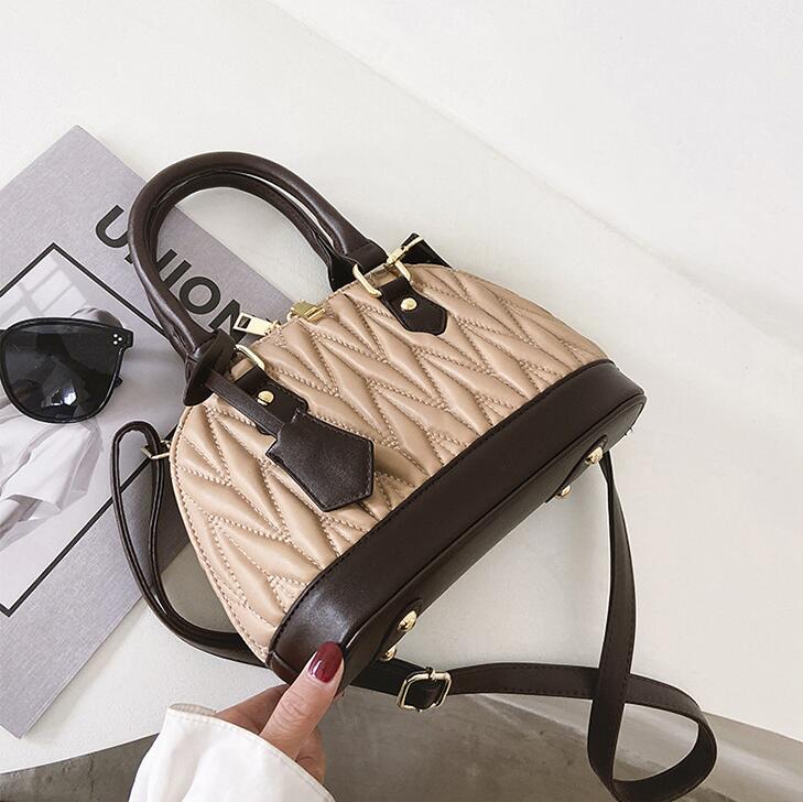 

Factory wholesale women handbag striped fashion bag Western style fold portable shell handbags retro leather shaped womens shoulder bags
