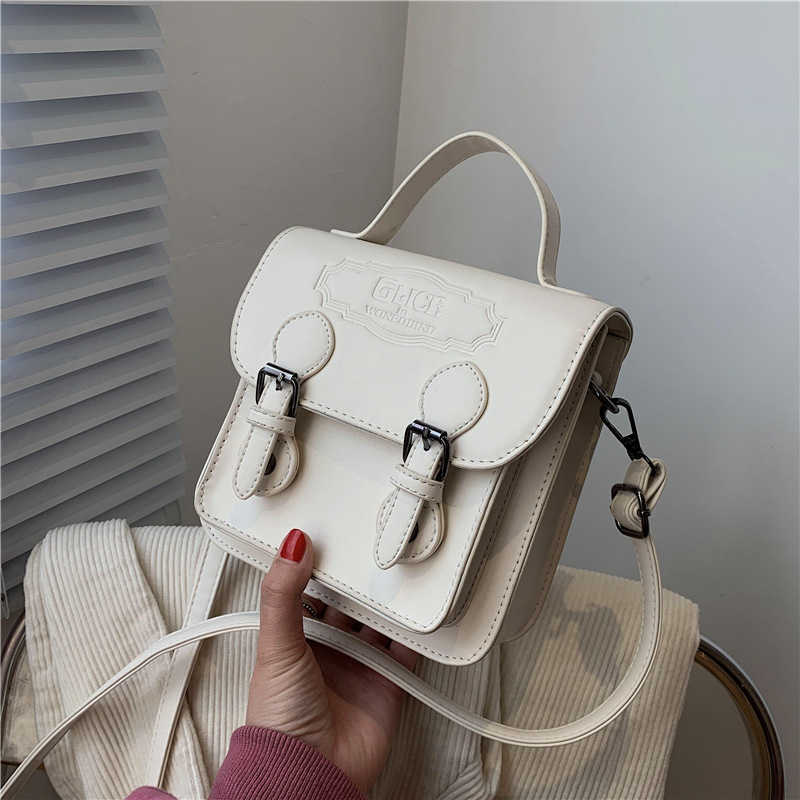 

Net red niche design women's 2021 new fashion versatile ins messenger high sense small square bag, White