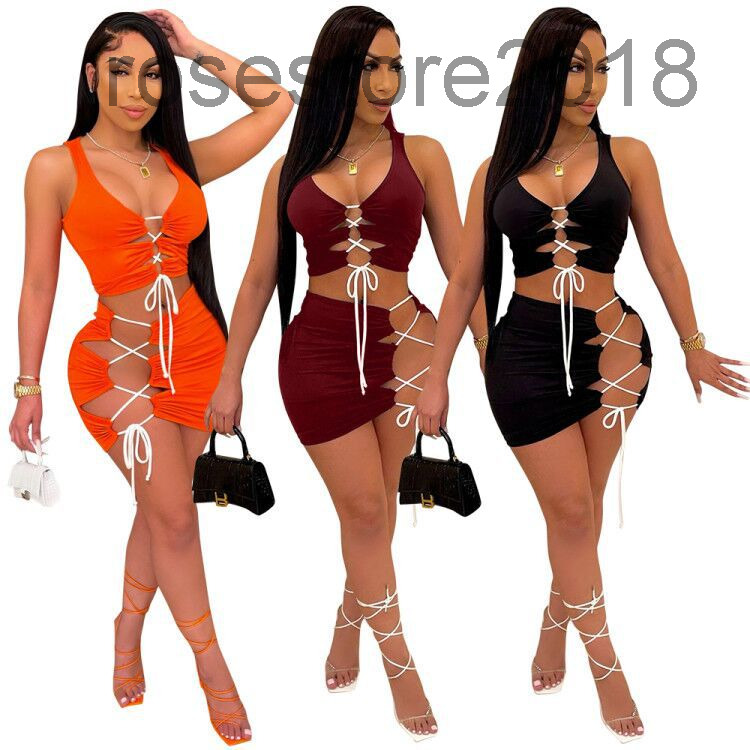 

2021 new summer women's solid color bandage sexy two piece sets Women Hollow Out Fashion Solid Color Sleeveless Bodycon Short skirt Suit, White