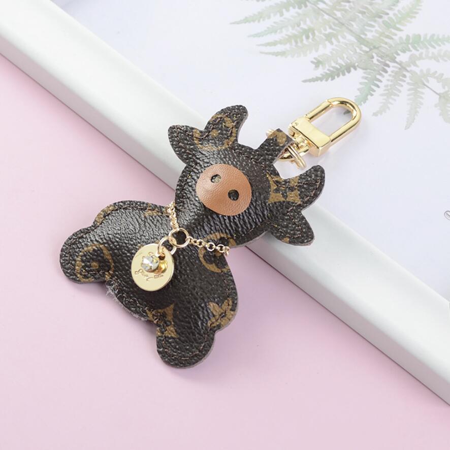 

Wholesale 4 Colors Fashion keychain Cute Cow Pattern leather keychains Car Fashion Accessories Key Ring Lanyard Key Wallet Chain Rope Chain