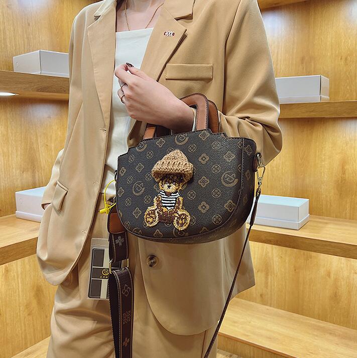 

Wholesale factory ladies shoulder bags classic printing retro handbag cute cartoon wool hat decorative wing bag street trend plaid handbags fashion backpack, Brownplaid-12912
