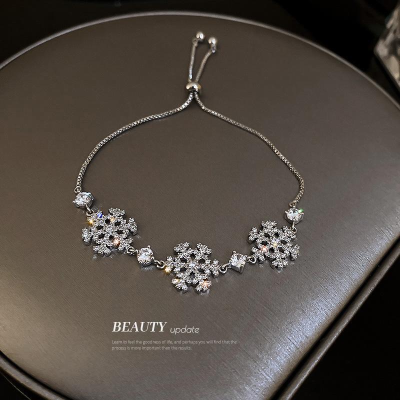 

Charm Bracelets Delicate Zircon Snowflake On Hand Female Minor Design Sense Pulling Bracelet Adjustable Women Jewelry, Golden;silver