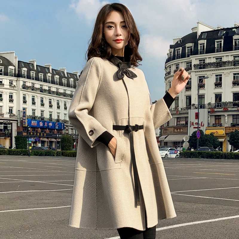 

Long section woolen coat female autumn A-shaped high quality seven-point sleeve plaid ladies jacket 210527
