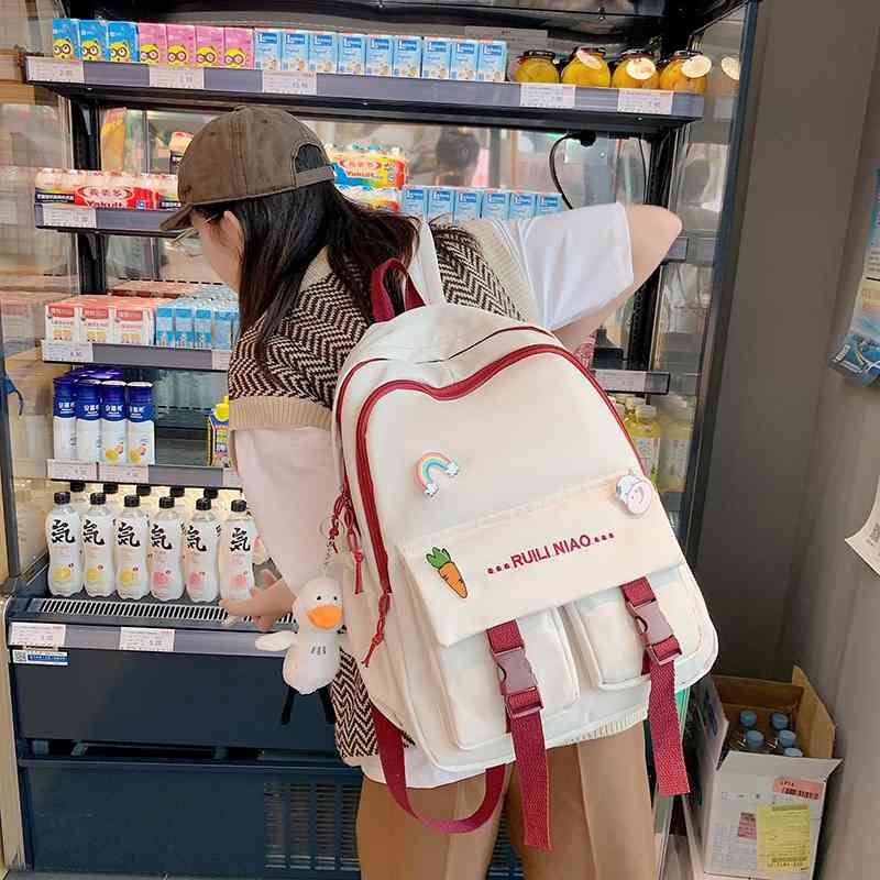 

Light student schoolbag female Korean version junior middle school students high capacity nylon multi compartment leisure backpack, White