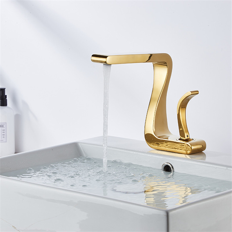 

2021 Gold Bathroom Mixer Tap Brass Wash Basin Hot and Cold Sink Faucet New Modern Pvqg