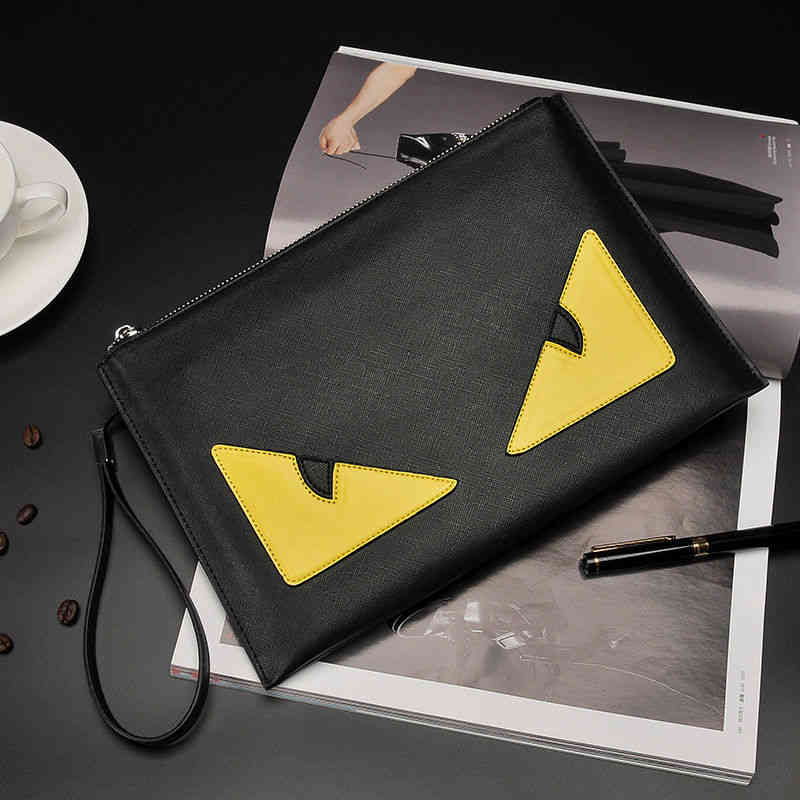 

Little monster new men's and women's student change handbag Korean version trend leisure society guy envelope clip bag